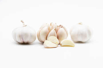 garlic slices isolated on white background.
