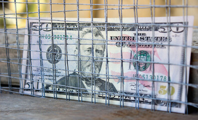 American dollars close up and economic sanctions. The concept of default and embargo