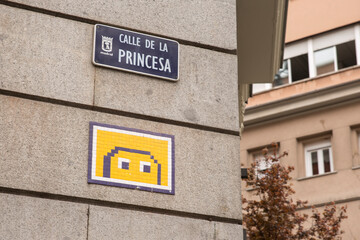 Detail of a road sign indicating Calle de la Princesa in Madrdi, Spain. 
