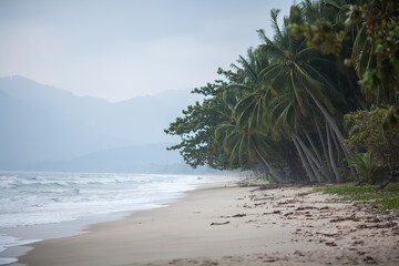 Khanom Beach, is well-known for its long white sand beach that stretches into the sea and rows of pine trees in Nakhon Si Thammarat Province, Thailand