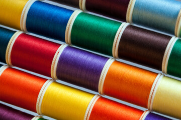 Colorful bobbins  of sewing thread