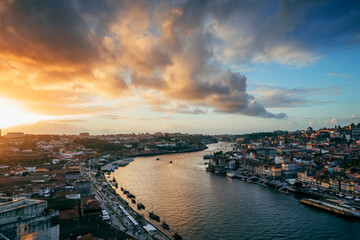 Fototapeta premium panorama of ribeira in porto at sunset