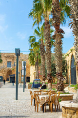 city street in israel. Outdoor cafe table