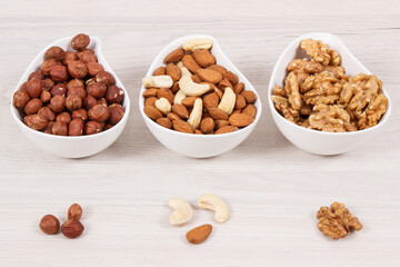 Various nuts and almonds containing healthy natural vitamins and minerals, nutritious eating