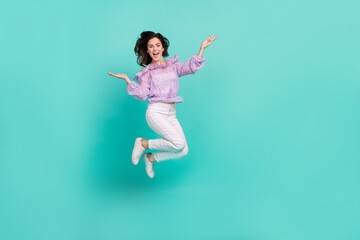 Fototapeta na wymiar Full body portrait of satisfied peaceful lady raise hands palms toothy smile isolated on teal color background