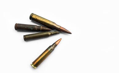 isolated old ak and m16 bullets on white background, soft and selective focus.