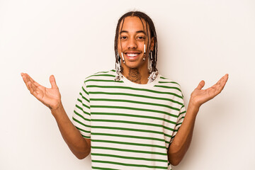 Young African American man isolated on white background joyful laughing a lot. Happiness concept.