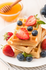 Belgian waffles for breakfast. Dessert food concept. 