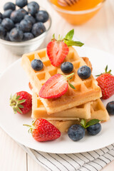 Belgian waffles for breakfast. Dessert food concept. 