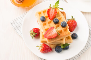 Belgian waffles for breakfast. Dessert food concept. 