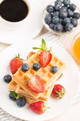 Belgian waffles for breakfast. Dessert food concept. 