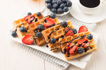 Belgian waffles for breakfast. Dessert food concept. 