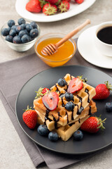 Belgian waffles for breakfast. Dessert food concept. 