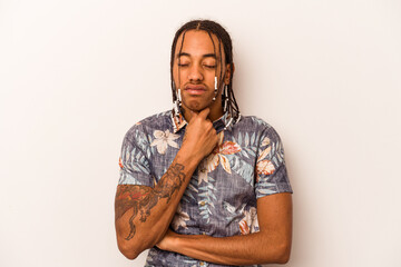 Young African American man isolated on white background suffers pain in throat due a virus or...
