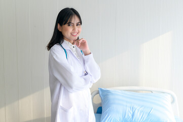 Portrait of young female doctor with stethoscope working at hospital, medical and health care concept