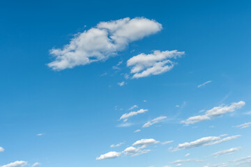 Blue sky with clouds. Beautiful, natural background.