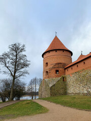 Fototapeta na wymiar Trakai castle or Traku pilis in the winter time. Trakai village, Lithuania.