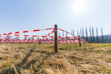 Barrier tape as a crawl obstacle in an obstacle course