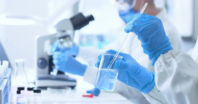 Researchers working together in the clinical lab