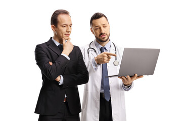 Doctor showing a screen from a laptop computer to a businessman