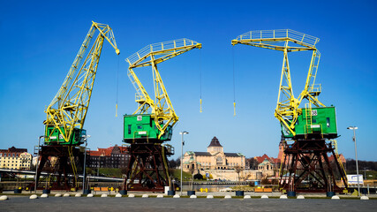 Szczecin cranes, a symbol and landmark of the city. - obrazy, fototapety, plakaty