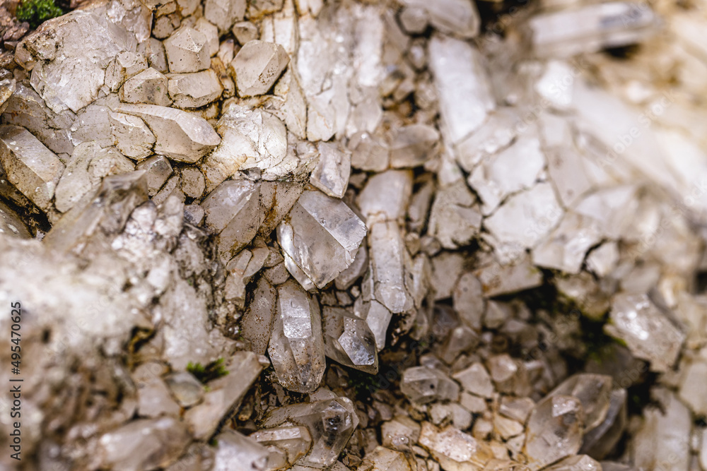 Sticker raw quartz in a mine, mineral being excavated in a pure state