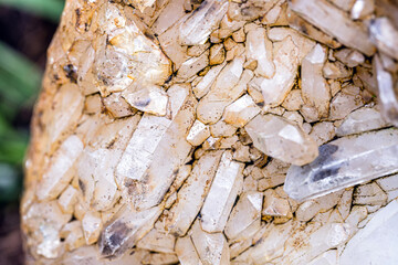quartz mine, detail of raw crystals on the wall of a mine, concept of precise stone being mined