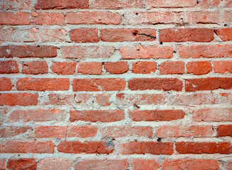 Masonry old rough red brick wall block urban pattern background building. Texture surface use as design element