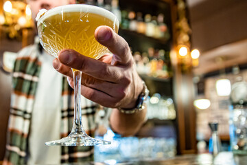 man hand bartender making cocktail on the bar counter