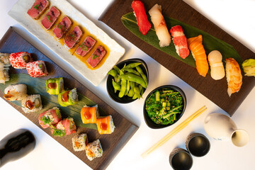 Traditional Japanese cuisine, traditional Asian food with sushi, nigiri and tuna with salads and take out, tuna tataki