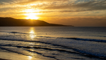 Obraz premium sunset on the sunset Canteras beach in Las Palmas city