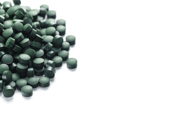 Green tablets made of natural organic spirulina