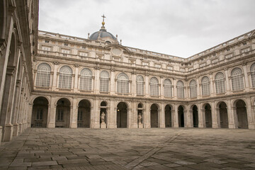 Fototapeta na wymiar Inner courtyard of the Royal Palace in Madrid, Spain. This royal residence is also called the Palace of the East. 
