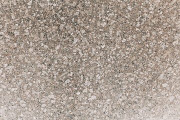 Granite stone wall background. Grunge close up texture.