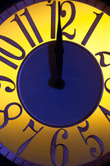 Wall clock backlit marking midnight