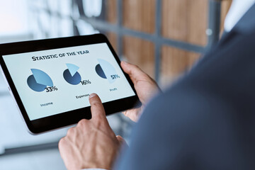business man analyzing the annual cryptocurrency exchange rate.