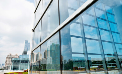 Fototapeta na wymiar Modern financial building with facade of glass