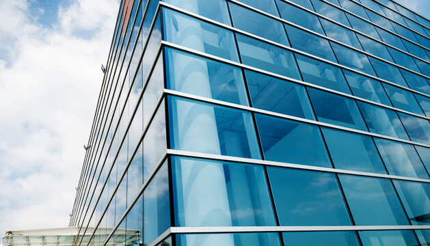 Part of modern business building against blue sky