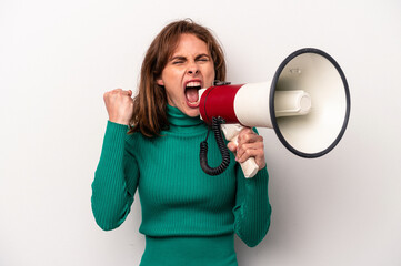 Young caucasian woman holding a megaphone isolated on white background