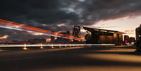 long exposure on the boardwalk with cityscape in the background