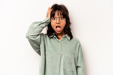 Young hispanic woman isolated on white background being shocked, she has remembered important...