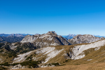 Panoramic view on the mountain peaks of the Hochschwab Region in Upper Styria, Austria. Sharp summits of Ebenstein and Hinterer Polster, Alps in Europe. Climbing, wilderness. Concept freedom