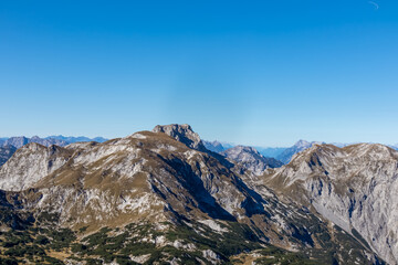 Panoramic view on the mountain peaks of the Hochschwab Region in Upper Styria, Austria. Sharp summits of Ebenstein and Hinterer Polster, Alps in Europe. Climbing, wilderness. Concept freedom