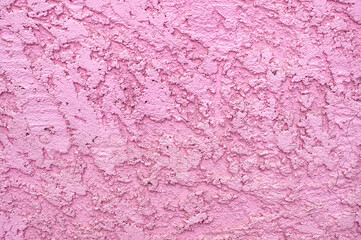 Fototapeta premium The surface of rough decorative sand-colored plaster