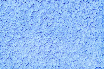 Fototapeta na wymiar The surface of rough decorative sand-colored plaster