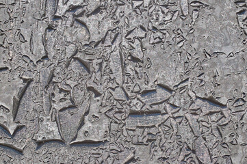 The surface of rough decorative sand-colored plaster