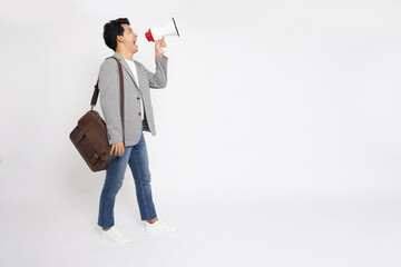 Young Asian business man holding megaphone isolated on white background, Speaker and announce concept, Full body composition