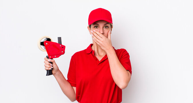 blonde pretty woman covering mouth with hands with a shocked. worker concept