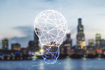 Abstract virtual light bulb illustration on blurry skyscrapers background, future technology concept. Multiexposure