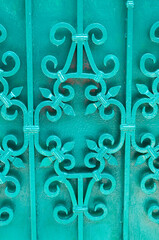 Close-up fence made of wooden rods. Wicker fence made of twigs. Natural fence made of branches. Background Texture